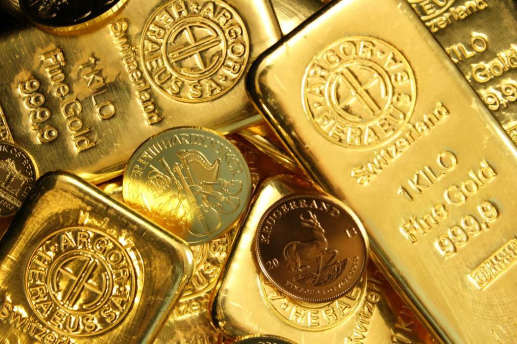 Goldmuenzen und Barren